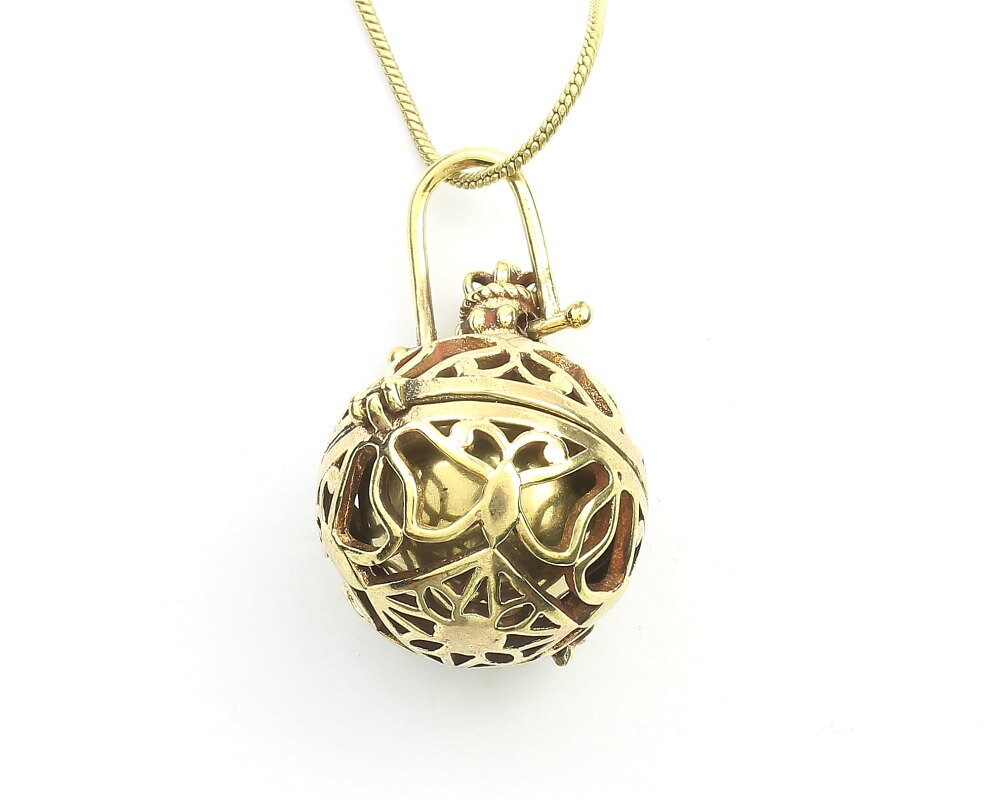 Meditation ball necklace clearance