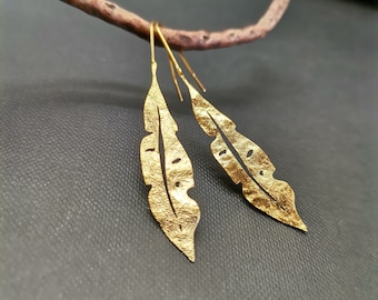 boucle d'oreilles dorée à l'or fin