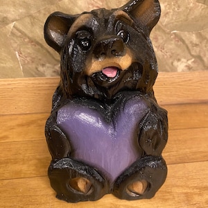 Chainsaw-carved bear with purple heart unique cute wood carving decor for log home rustic handcrafted personalized wooden blackbear carving