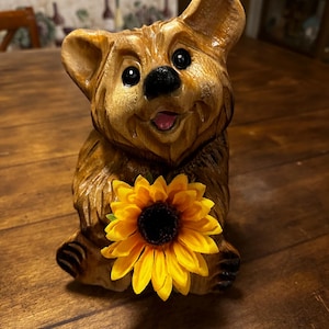 Chainsaw carved bear with sunflower cute woodcarving of bear with flower gift for Mom Christmas present for mother unique wooden home accent