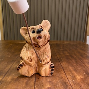 Chainsaw carved bear with marshmallow.  Welcome bear. Cute bear. Wood carved bear.  Log cabin decor. Rustic art. Bear carving. Chainsaw art.