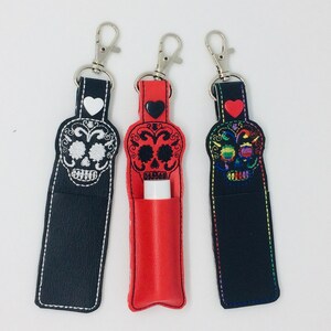 Sugar Skull lip balm holder with lobster clasp