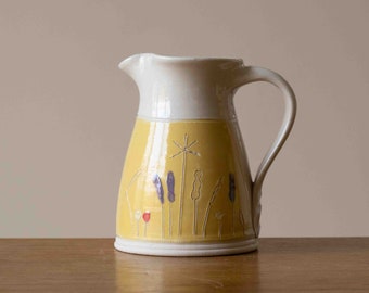 Small Handmade Yellow Pottery Jug with Wildflower Design