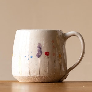 Small White Handmade Pottery Coffee Cup or Mug with Midsummer Flower Design