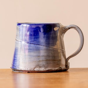 Small White Handmade Pottery Mug or Coffee Cup with Bright Blue Brushed Decoration