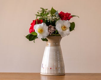 Large white handmade pottery vase with flared rim and Midsummer flower design. Ideal for Mothers day gift.