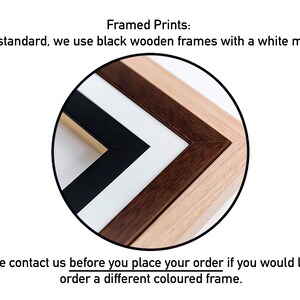 May include: Close-up of framed prints with black, brown, and natural wood frames. The frames have a white mount. Text at the top reads "Framed Prints: As a standard, we use black wooden frames with a white mount."