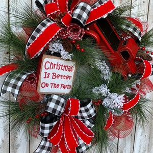 May include: A Christmas wreath with red and black buffalo plaid ribbon, a red truck, and a sign that reads "Christmas Is Better On The Farm".