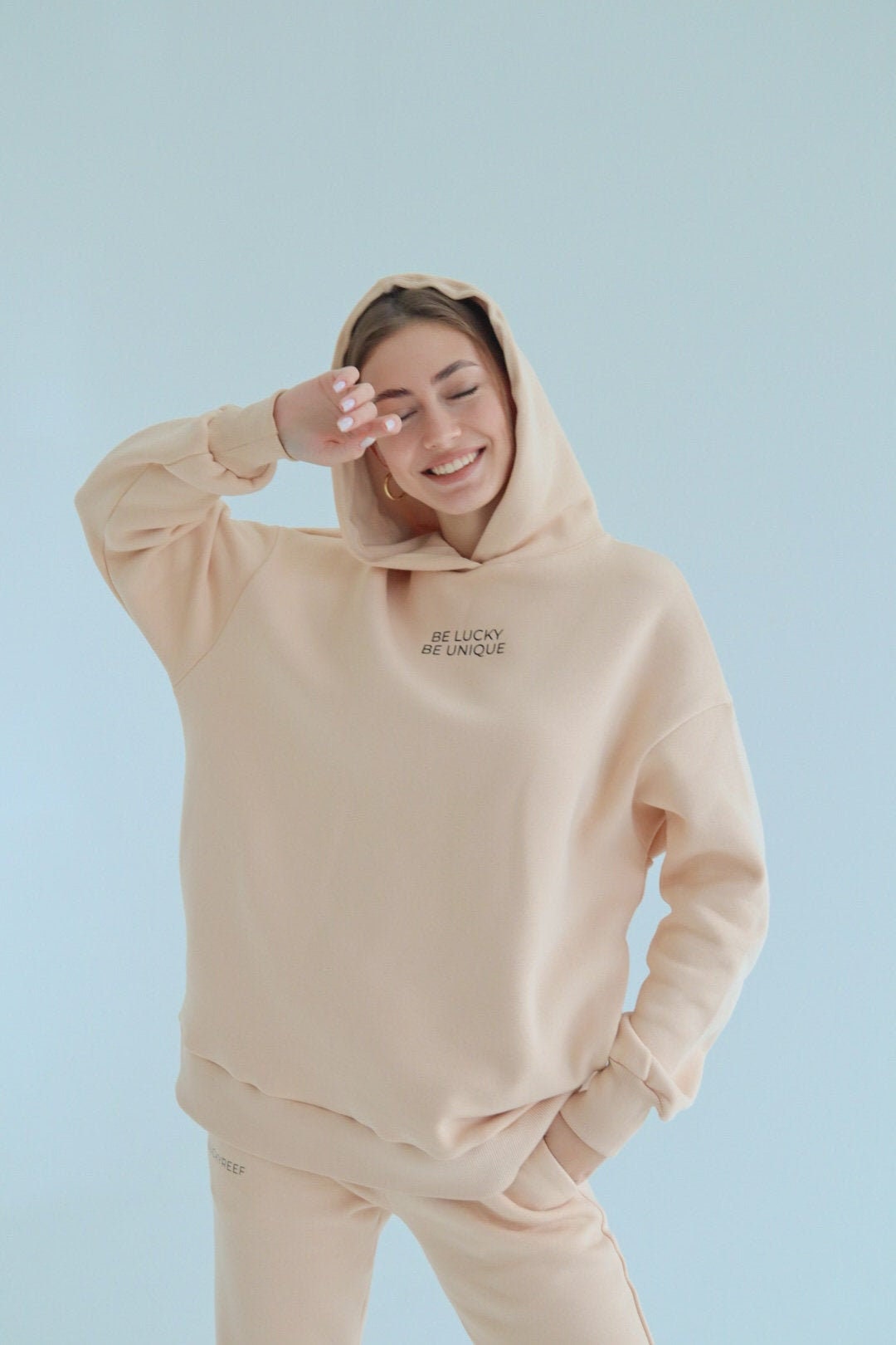 beige color hoodie