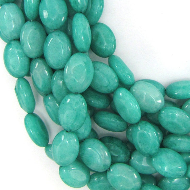 18mm green jade flat oval beads 16 strand 10500 image 1