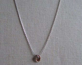 Silver mobius necklace. Also in gold
