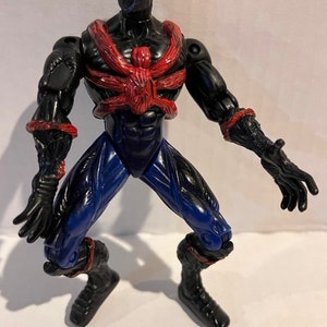 May include: Black and blue action figure of Spider-Man with red webbing and a black mask with red eyes.