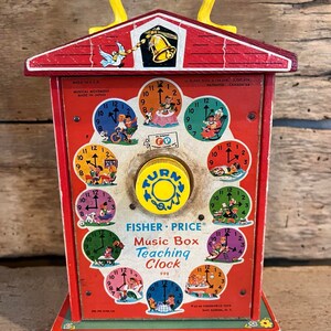 アメリカ 60年代 Fisher-Price Clock 音楽ボックス Vintage Fisher Price Music Box Teaching Clock (1960s) - Etsy