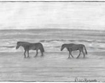Caballos en la playa