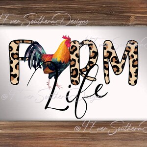 May include: A framed print featuring a colorful rooster illustration with the words "FARM LIFE." The letters "FARM" have a leopard print design. The frame is made of rustic, light brown wood.