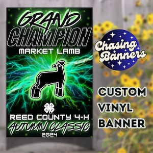 May include: A green and black vinyl banner with a black lamb silhouette and the text "GRAND CHAMPION MARKET LAMB REED COUNTY 4-H AUTUMN CLASSIC 2024". The banner also features a blue circle with white stars and the text "Chasing Banners" and the text "CUSTOM VINYL BANNER".