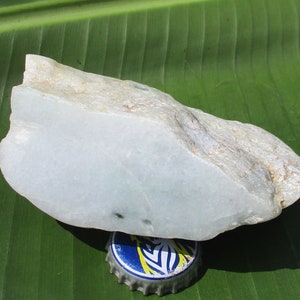 Maw Sit Sit Jadeite Rough; Fine Light Texture Icy White, Translucent. 354 Grams.