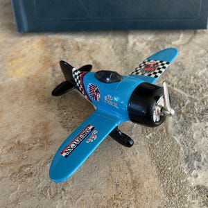 Vintage Toy Airplane, Pullback Motor, Plane Rolls Across Floor and Propeller Spins, Metal and Plastic Construction, Rubber Wheels, See Video