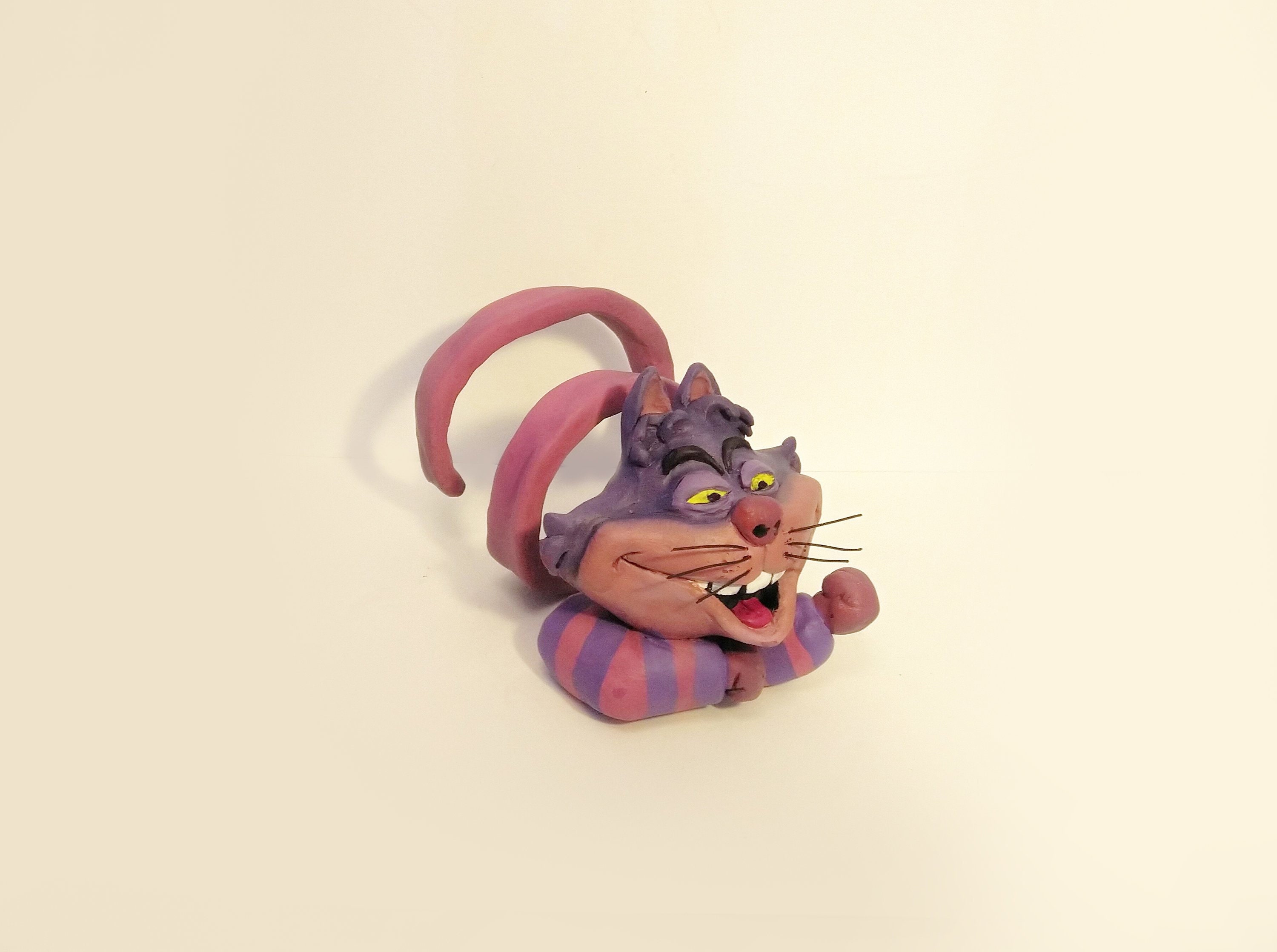 2.76 Inch Clear Enesco Disney Showcase Alice in Wonderland Cheshire Cat Miniature Figurine 2.76 Inch Clear Enesco Disney Showcase Alice in Wonderland Cheshire Cat Miniature Figurine