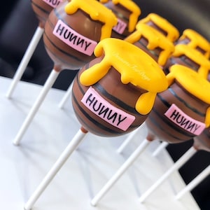 Dozen (12) Hunny Themed Cake Pops.Winnie The Pooh Cake Pops.Honey Cake Pops. Winnie the pooh baby shower. Winnie the pooh birthday.