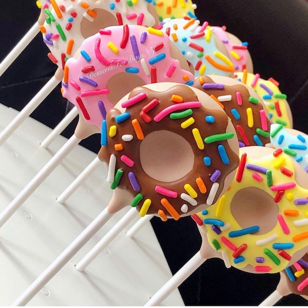 Donut Cake pops. Donuts. Donut Theme. Cake Pops. Donut Theme Birthday. Donut Party. Donut Cake Balls. Dessert Table. First Birthday.