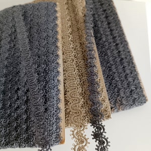 the photo shows viscose woven trims in the three available colors