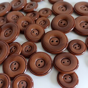 the photo shows brown plastic buttons