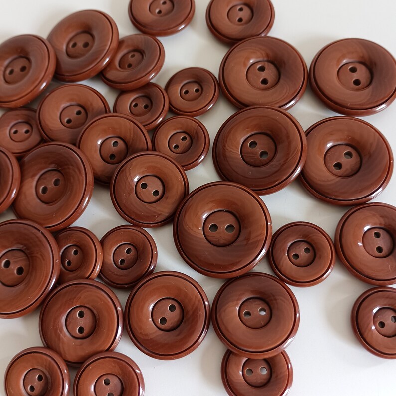 the photo shows brown plastic buttons