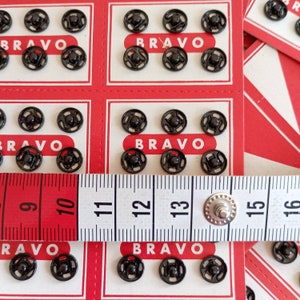 the snaps are photographed next to a tape measure
snap size: 7mm
