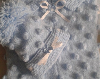 Baby sleeping bag/papoose and pompom hat