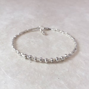 Bracelet Karen Hill Tribe en argent et perles marguerite : style Sundance