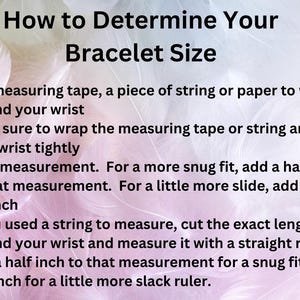 May include: A pink and white background with text explaining how to determine your bracelet size. The text includes instructions on how to measure your wrist using a measuring tape, string, or paper. It also explains how to add a half inch or a full inch to the measurement for a snug fit or a little more slack.
