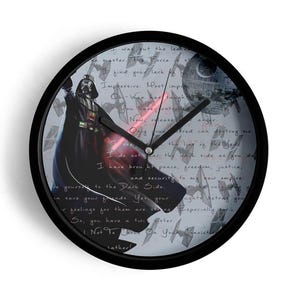 May include: Black round wall clock featuring Darth Vader with a red lightsaber, the Death Star, and text from Star Wars. The clock has a black frame and white background with a vintage, distressed look.