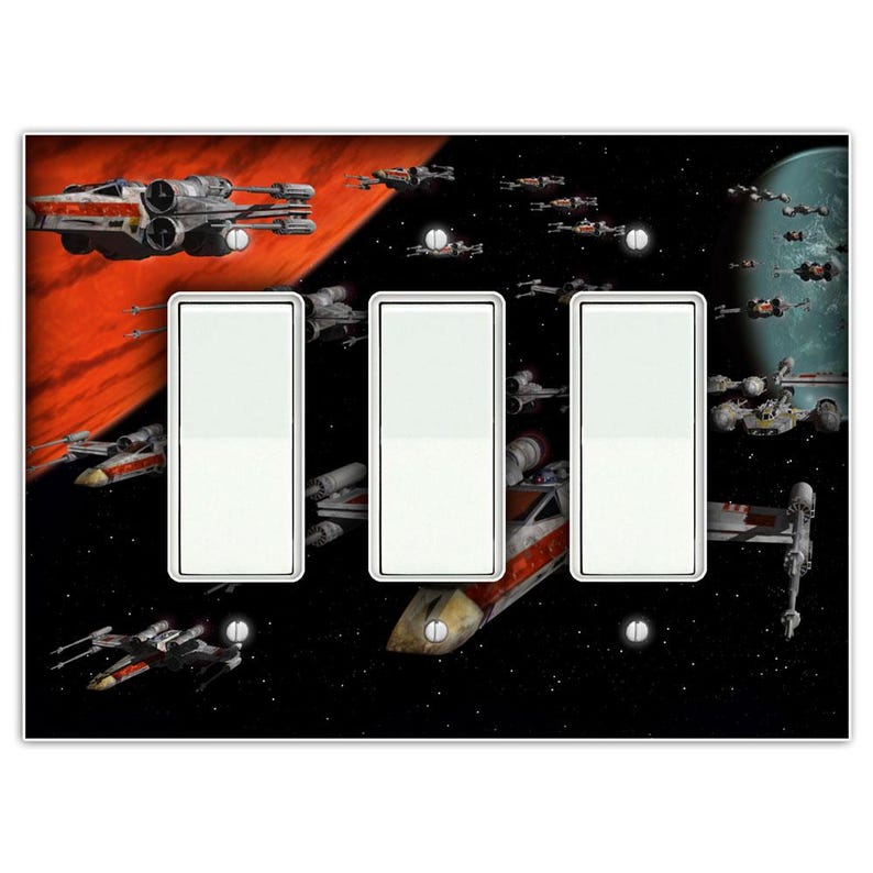 May include: A triple light switch cover with a Star Wars X-Wing fighter space battle scene. The cover features a red and orange planet in the background and a black and white starry sky with multiple X-Wing fighters flying in formation.
