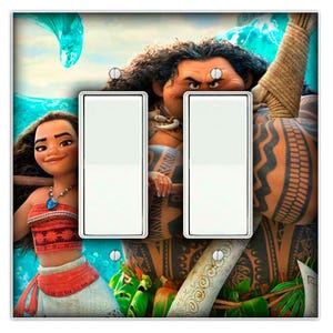 May include: A light switch plate featuring a colorful illustration of Moana and Maui from the Disney movie Moana. The image shows Moana with her hair in a braid and a red and orange dress, while Maui is in the background with his signature tattoos and a large fishhook.