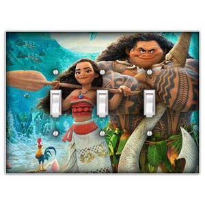 May include: A light switch plate featuring a colorful illustration of Moana and Maui from the Disney movie Moana. The image shows Moana holding a paddle and Maui with his signature tattoos and fish hook.