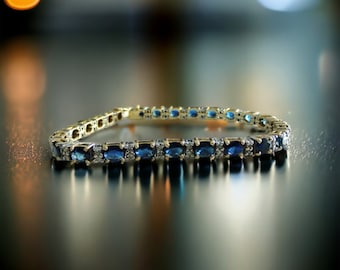 6.75ct.tw. Oval Blue Sapphire Diamond Accent Bracelet in 14K Two Tone Gold