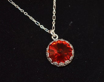 Necklace, sterling silver and red swarovski crystal necklace