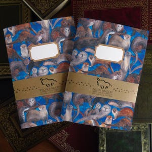 Set di diario e quaderno con copertina morbida A5 "Raft of Otters" - 76 pagine a righe e 36 pagine bianche - Materiali riciclati - Disegno ad acquerello