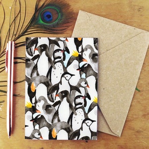 Tarjeta de felicitación de pingüinos en movimiento