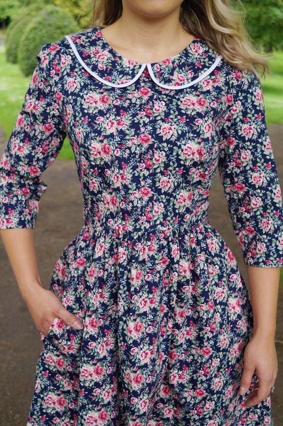 navy and pink floral tea dress