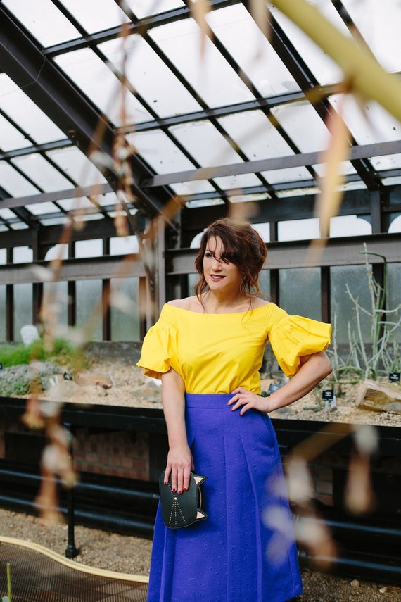 bright yellow off the shoulder top