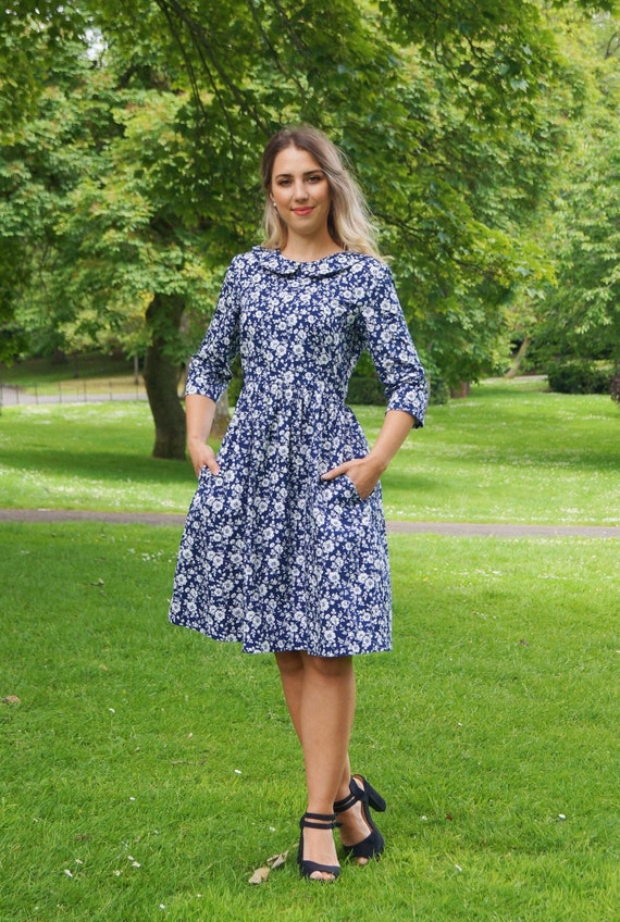 navy dress with white flowers