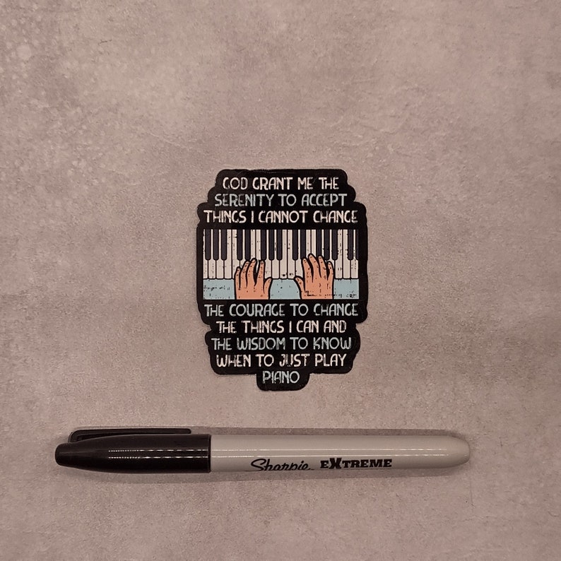 May include: A sticker with a piano keyboard and the text "God grant me the serenity to accept things I cannot change. The courage to change the things I can and the wisdom to know when to just play piano."