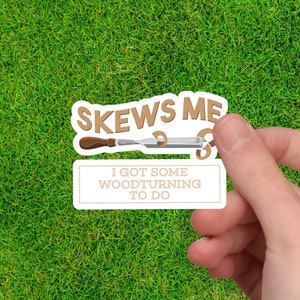 May include: White sticker with brown text that reads "Skews Me I Got Some Woodturning To Do". A woodturning tool is pictured above the text.