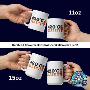 May include: Two white ceramic mugs with a black and orange design. The mugs feature the text "420&deg;C Glaze It" and a graphic of a clay pot. The mugs are available in 11oz and 15oz sizes.