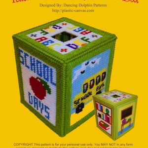 May include: A green plastic canvas tissue box with a school bus, apple, and the words "School Days" on it. The box is designed to be used as a tissue box holder.