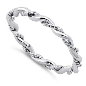 May include: A silver twisted rope band ring. The ring is marked with "925" on the inside.