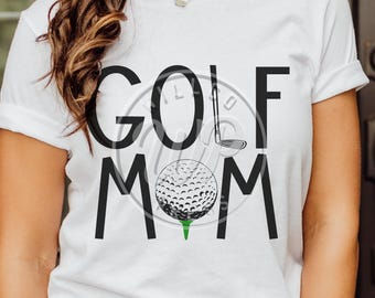 May include: White t-shirt with black text that reads "GOLF MOM". The text is in a bold, blocky font. A golf ball and club are depicted in the center of the text.