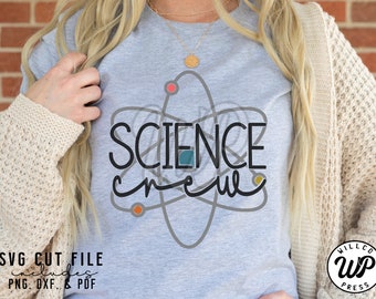 May include: A gray t-shirt with a stylized atom design and the text "SCIENCE crew".